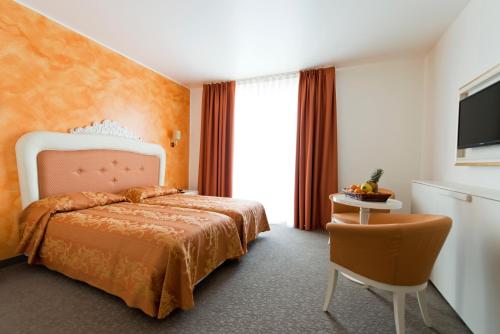 Cama o camas de una habitación en Palace Hotel & SPA La CONCHIGLIA D' ORO