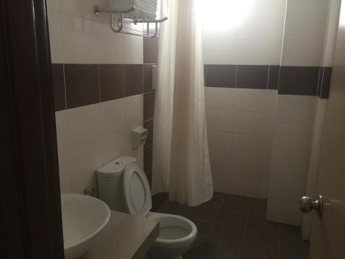 Koupelna v ubytování Homestay at Lagoon Park Resort