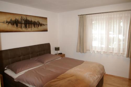 A bed or beds in a room at Ferienwohnung Kohlhofen