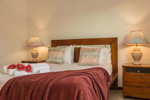 מיטה או מיטות בחדר ב-Casa Areal de Santa Barbara
