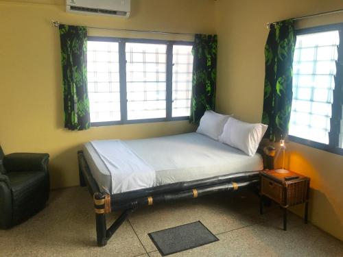 Ένα ή περισσότερα κρεβάτια σε δωμάτιο στο Royal German Guest House