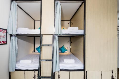 Postel nebo postele na pokoji v ubytování Fedora Hostel