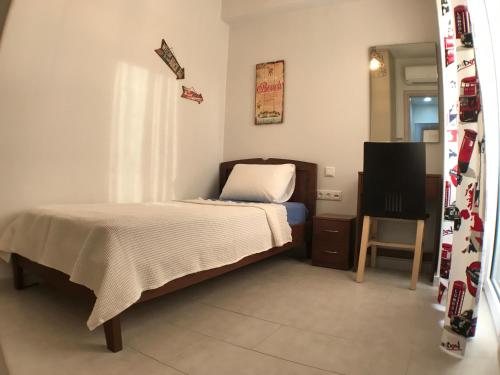 Ένα ή περισσότερα κρεβάτια σε δωμάτιο στο Galini Villas