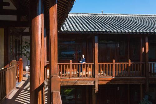 Un balcón o terraza en Jun Bo Xuan Boutique Hotel