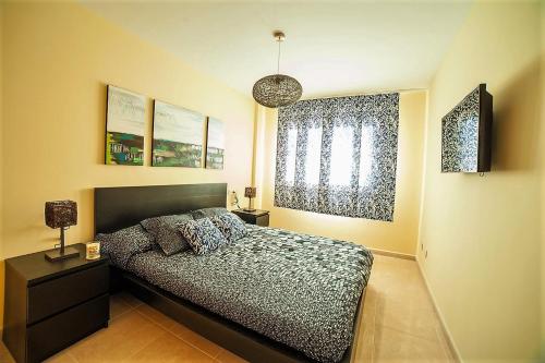 Posteľ alebo postele v izbe v ubytovaní Residencial La Perla