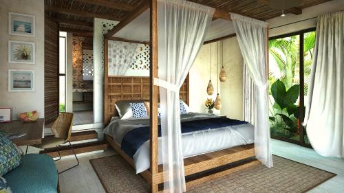 1 dormitorio con cama con dosel en una habitación en Azucar Hotel Tulum, en Tulum
