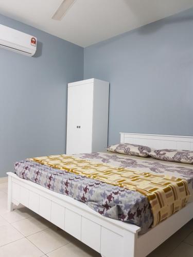Krevet ili kreveti u jedinici u objektu Homesweet Homestay Jasin