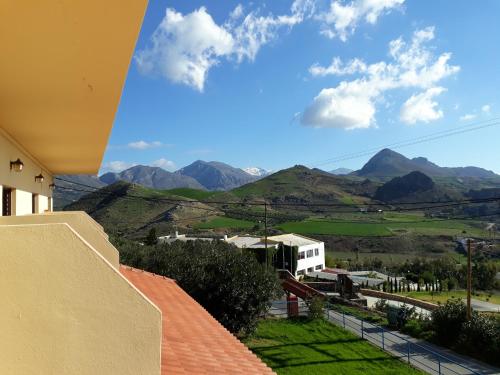a view of the mountains from a house at Zefyros Studios in Damnoni