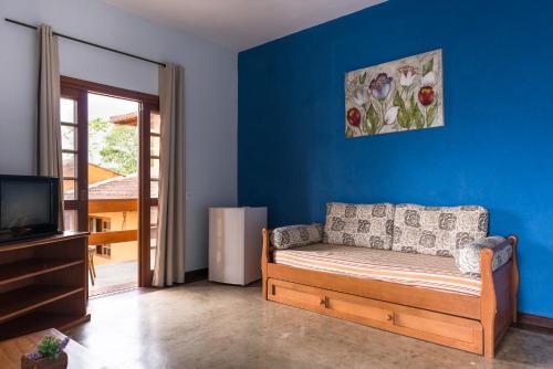 Ruang duduk di Pousada Ilhote da Prainha