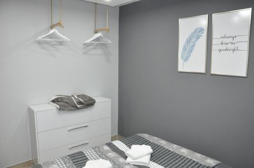 Postel nebo postele na pokoji v ubytování Aria lux apartmani