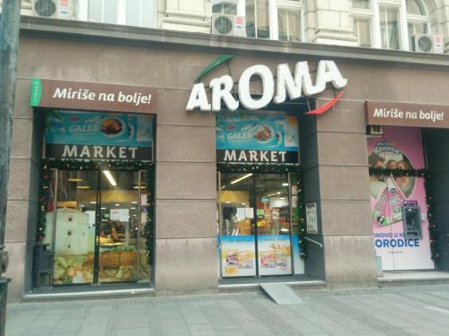 a amazon store on a city street with windows at Apartment Jastuk in Belgrade