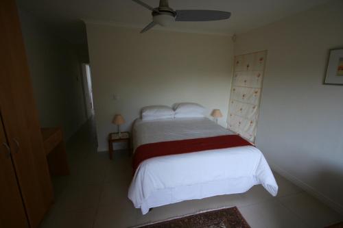 Katil atau katil-katil dalam bilik di Home on Plato