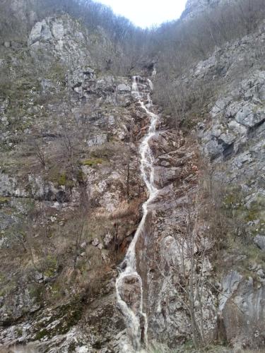 a waterfall on the side of a mountain at Golemi kamik Pirot in Pirot
