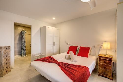 Postel nebo postele na pokoji v ubytování Granada I Apartments