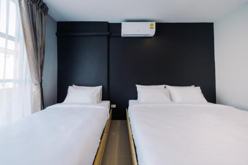 Letto o letti in una camera di PUNSUK@PRASING