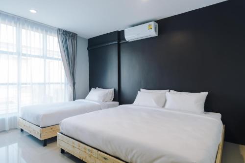 Letto o letti in una camera di PUNSUK@PRASING