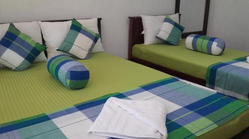 Cama o camas de una habitación en The European Gate - Anuradhapura