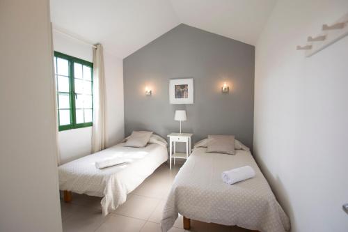 Postel nebo postele na pokoji v ubytování Aloha Maspalomas - Wonderful private terrace