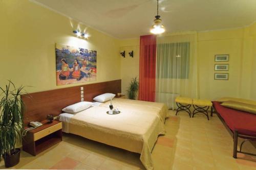 Ένα ή περισσότερα κρεβάτια σε δωμάτιο στο Elimeia 3 Hotel