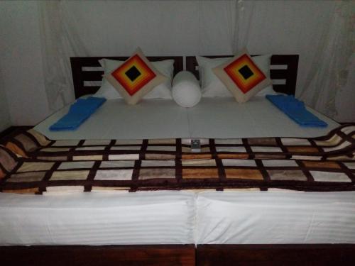Ein Bett oder Betten in einem Zimmer der Unterkunft Little Cottage
