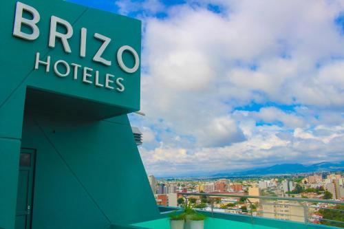 a building with a sign for a hotel at Brizo Salta in Salta