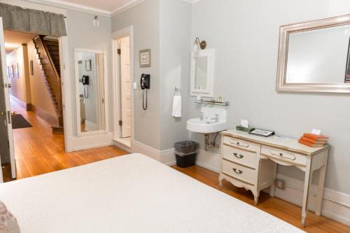 a bathroom with a sink and a sink at Centralia Square Grand Ballroom and Vintage Hotel in Centralia