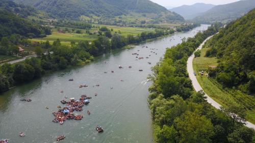 a group of people rafting down a river at Kucerak na Drini in Bajina Bašta