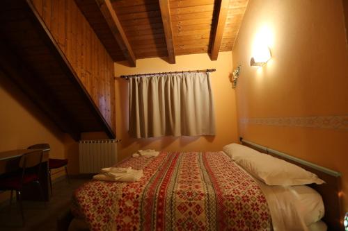 Postel nebo postele na pokoji v ubytování Da Cecilia