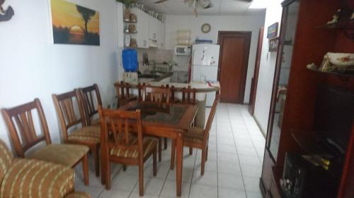 a kitchen and dining room with a table and chairs at NUESTRA CASA-OUR HOME Salinas by A2CC in Salinas
