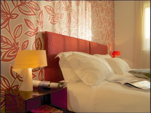 Spluga Sosta & Hotelにあるベッド