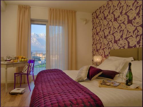 Postel nebo postele na pokoji v ubytování Spluga Sosta & Hotel