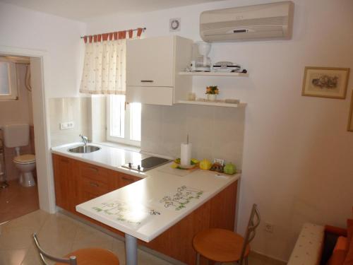 Kitchen o kitchenette sa Apartment Santa Croce Free Parking