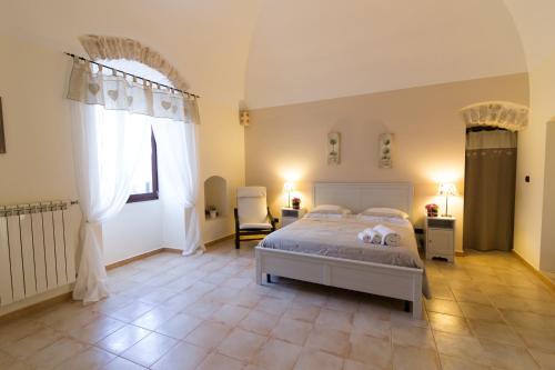 Katil atau katil-katil dalam bilik di B&B Maria Chiara