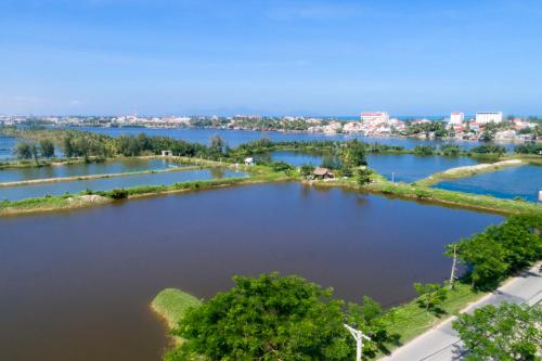an aerial view of a large body of water at Happy Life Memories Hoi An Hotel & Spa in Hoi An