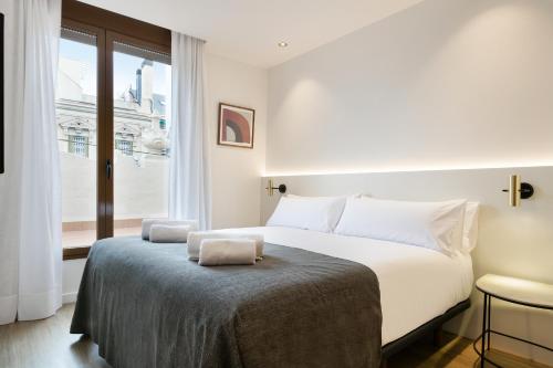 Postel nebo postele na pokoji v ubytování Vale Suites