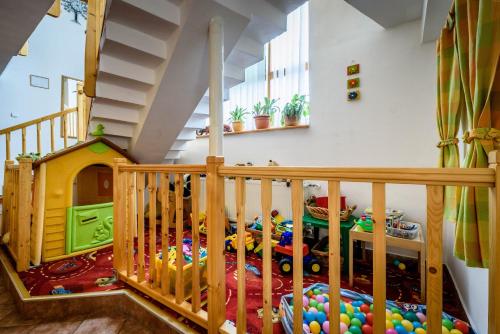 a play room with a bunch of toys in it at Hotel Villa Siesta in Smokovce