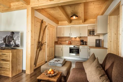 Kuchyň nebo kuchyňský kout v ubytování AlpenParks Hagan Lodge Altaussee