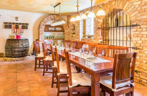 a large dining room with a long table and chairs at Pichlgut in Radstadt