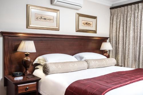 Ένα ή περισσότερα κρεβάτια σε δωμάτιο στο Blaauwheim Guest House
