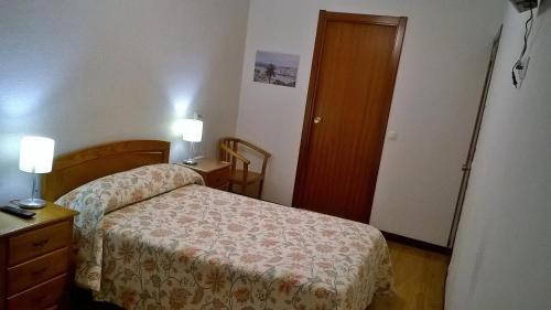 Hostal El Cairoにあるベッド