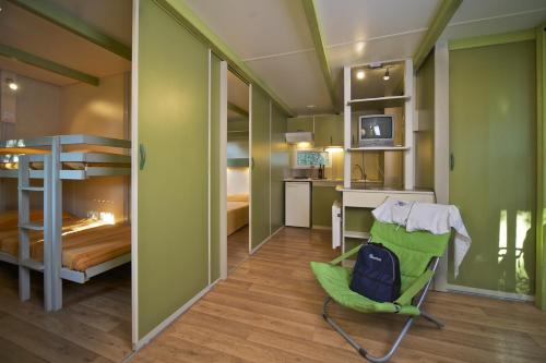 Postel nebo postele na pokoji v ubytování Villaggio Turistico Camping Il Fontino