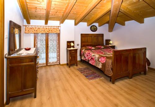 Postel nebo postele na pokoji v ubytování Al Molin B&B