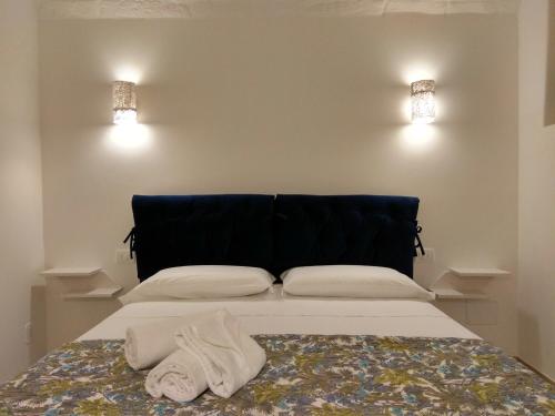 Giường trong phòng chung tại Loft Nonna Francesca