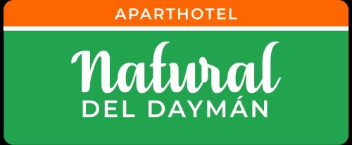a green and white sign that readsnatural del dawnman at Apart Hotel Natural del Daymán in Salto