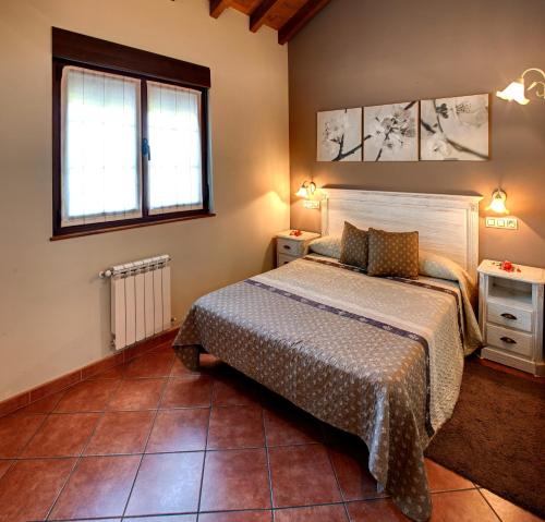 Postelja oz. postelje v sobi nastanitve Apartamentos Rurales "La Torre" y "El Pielago"
