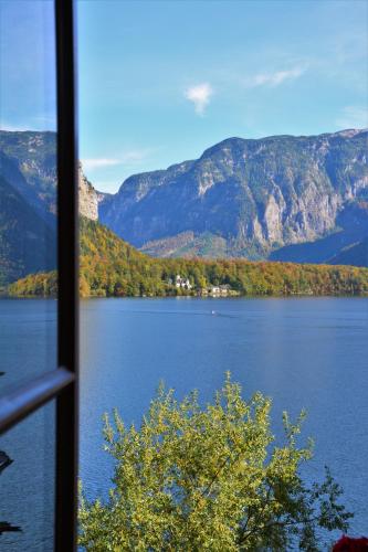 a view of a lake from a window at Haus Franziska in Hallstatt