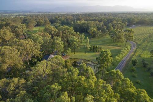 an aerial view of a park with trees and a road at Deja Vu Estate in Pokolbin