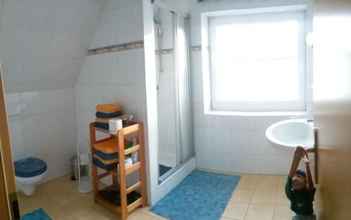 Ein Badezimmer in der Unterkunft Hus Boock