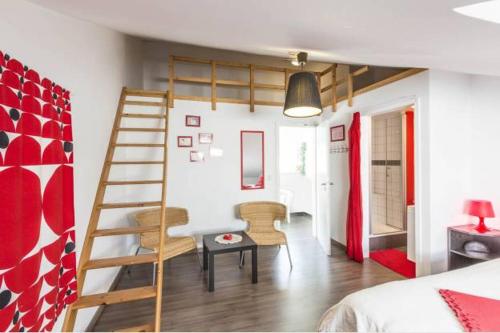 Ένα ή περισσότερα κρεβάτια σε δωμάτιο στο La Villa Coocon