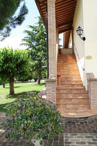 Сад в Relais Madonna di Campagna